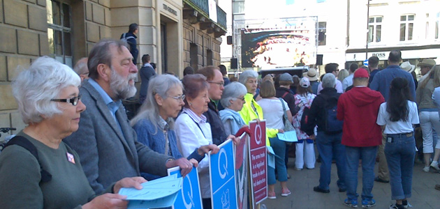Friends in Cambridge hold vigil for peace