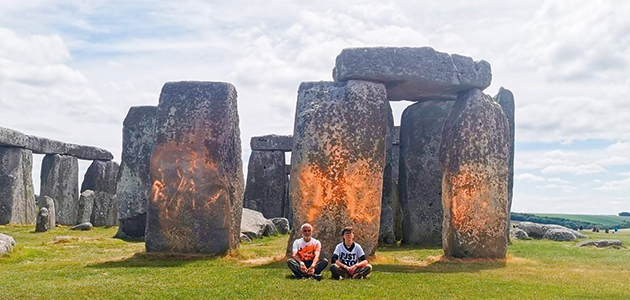 Quaker spray paints Stonehenge for climate