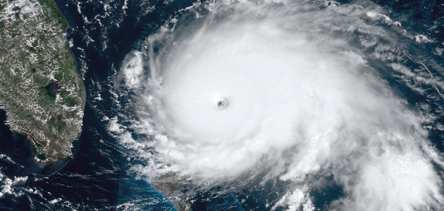 ‘As I passed, folks were rebuilding their houses and fishing boats.’