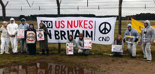 Friends protest weapons at US base